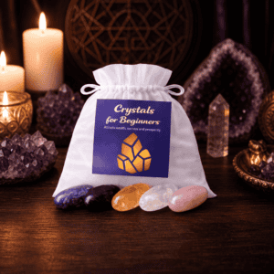 Crystals for Beginners bag on a wooden altar with candles