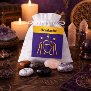 Headache crystal bag on a wooden altar with candles