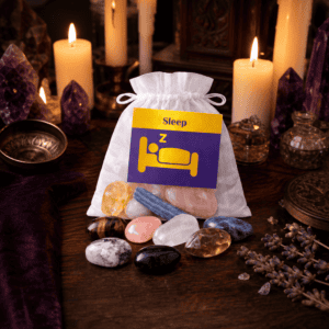 Sleep crystal bag on a wooden altar with candles